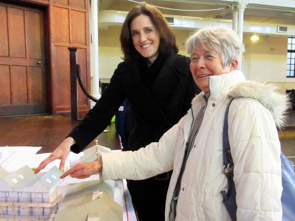 Angela Ratcliffe, shows Chipping Barnet MP Theresa Villiers the flat she hopes to occupy