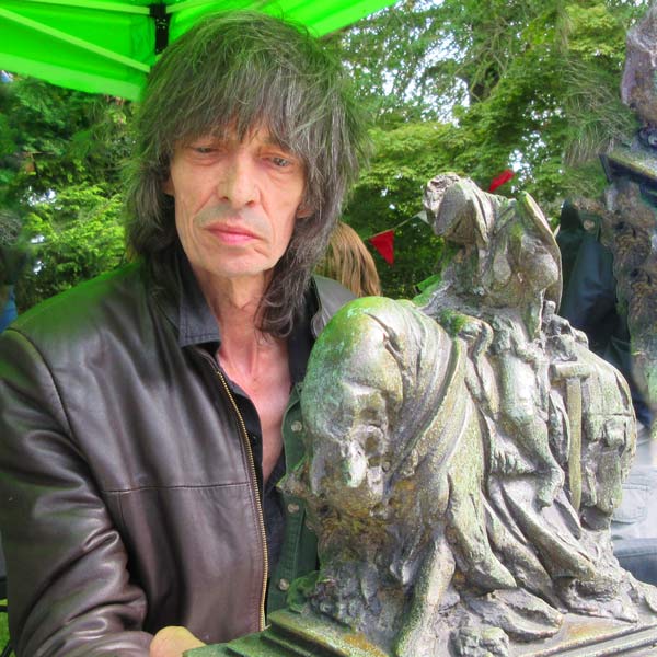 The Barnet sculptor John Somerville with a copy of his bronze sculpture which he has donated to Barnet Museum