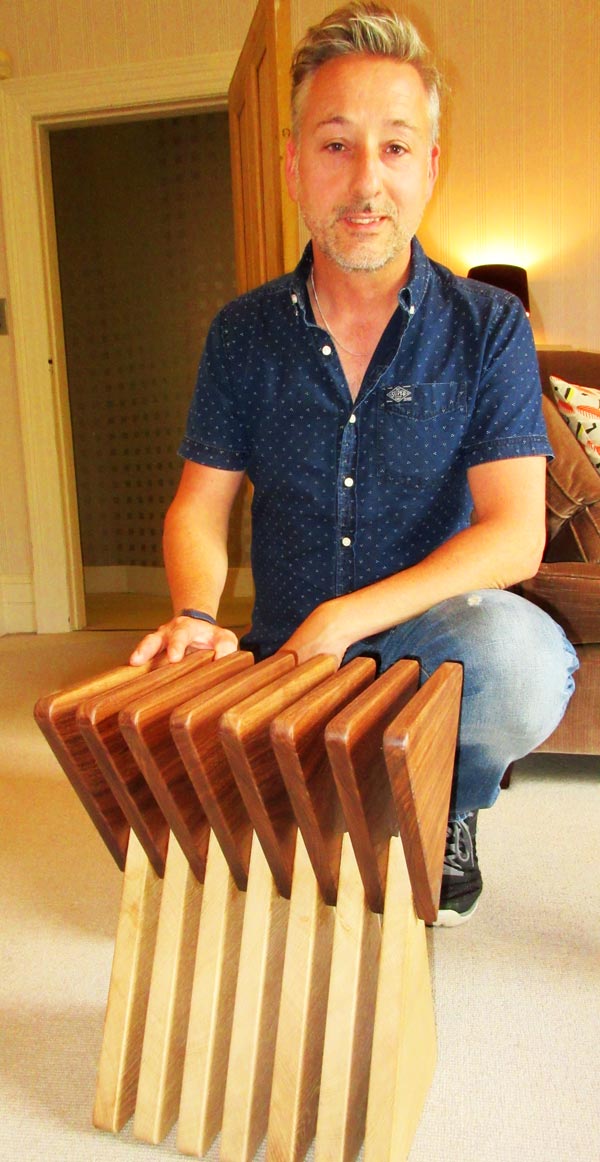 The Vinci stool doubles up as a side table or magazine rack