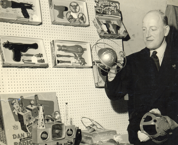 Eric Lucas at a trade exhibition between 1950 and 1965