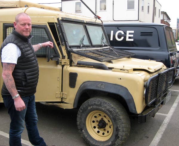 Ben Dillon beside one of three “snatch” vehicles supplied for filming the Cormoran Strike. In the background is a Ford Transit Mark 1 Police van that featured in the latest Morse drama, Endeavour