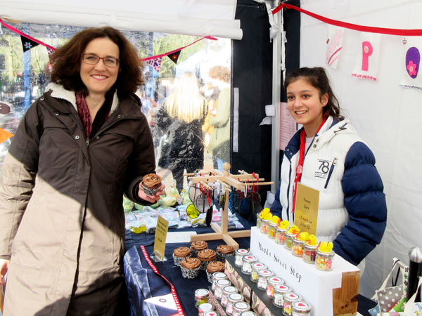 Theresa Villiers MP at the stall of Maud Quinton 